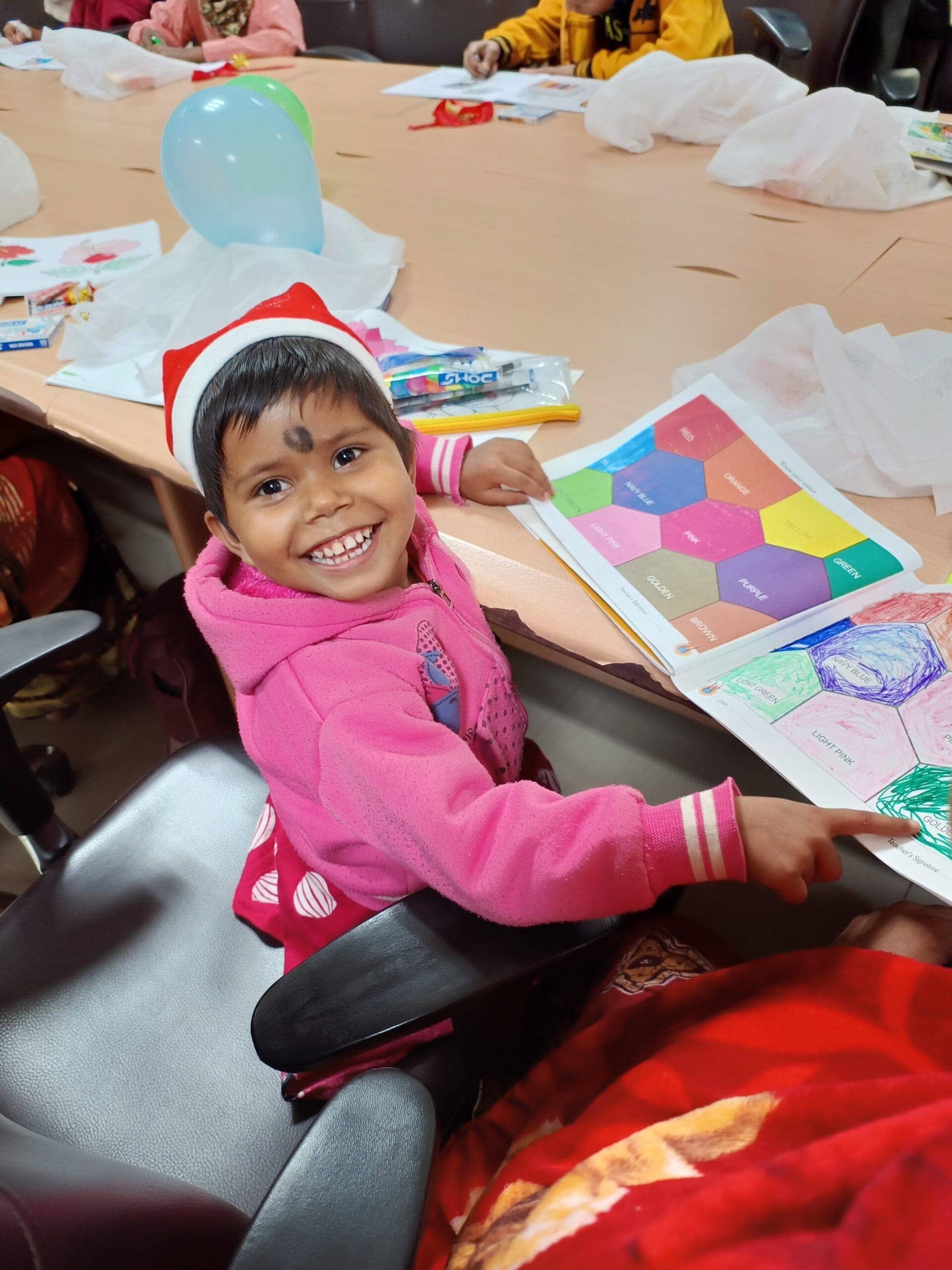 Raja festival celebration with underprivileged children